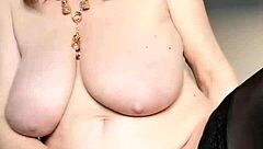 i see this busty mature milf in stockings posing closeup