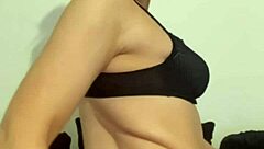 Young 18+ British brunette coed hints at horny dildo riding and squirting in high definition POV webcam tease.