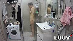 Beautiful Alice Flashes Natural Tits and Shaves Pussy Under Shower Voyeur Cam