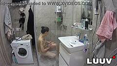 Beautiful Alice Flashes Natural Tits and Shaves Pussy Under Shower Voyeur Cam