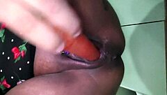 brazilian milf squirts wildly fingering pussy with carrot