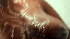 Ebony soapy natural tits glistening wet and bouncy