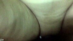 relaxed woman lies back casually chatting about her day with small tits visible