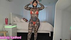 Watch her huge fake tits burst from micro bikini haul