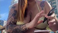 Horny beach exhibitionist flashes big pussy for guys