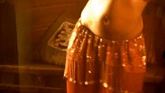 Exotic dancer strips teasing with sensual power and erotic moves