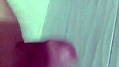 gorgeous handjob strokes massive cock to explosive finish