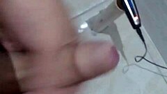 gorgeous handjob strokes massive cock to explosive finish