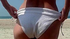 fat ass pees white bikini on crowded public beach!