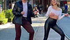 blonde babe sways seductively in tight leggings