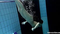 Aneta’s Big Tits Tease in Purple Poolside Dress