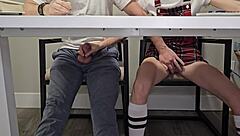 skinny college student flashes wet pussy under desk