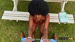 small debt pays with big ebony pussy on desk