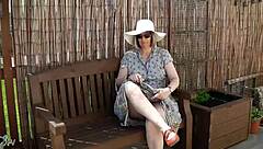 naughty housewife strips naked outdoors garden