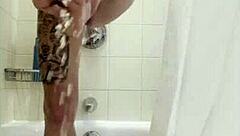 that steamy bath grope leads right into her slick handjob finish