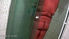 hidden cam catches chubby bbw milf's huge natural tits bath