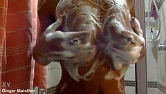 Ginger's wet soapy nipples tits belly closeup in ripped jeans