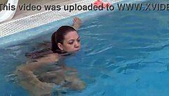 Hungarian brunette babe teases big tits and ass in naked pool shower swim