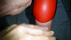 Wanking my wife's warm piss-filled toy