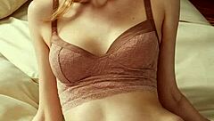 Cute model slips into flowery panties and barefoot lingerie