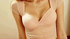 Cute model slips into flowery panties and barefoot lingerie