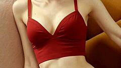 Cute model slips into flowery panties and barefoot lingerie