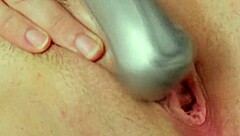 Hairy milf rams dildo deep in mature pussy