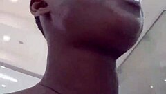 Nigerian babe masturbates wildly in mall bathroom stall