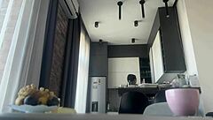 Sexy brunette cleans house flashing shaved pussy