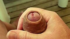 Naked camper strokes huge cock on terrace edge