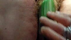 granny fucks hairy pussy with cucumber boldly