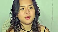 horny asian teen masturbates wildly to throbbing music beats