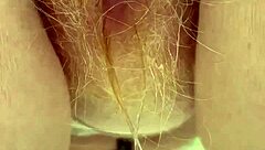 redhead pees through her hairy pussy!