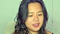 horny asian teen masturbates wildly to throbbing music beats