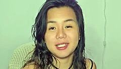 horny asian teen masturbates wildly to throbbing music beats