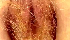 redhead pees through her hairy pussy!