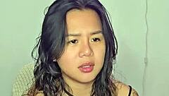 horny asian teen masturbates wildly to throbbing music beats