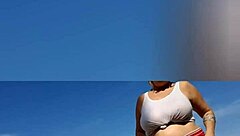 Mature blonde big tits solo beach pose