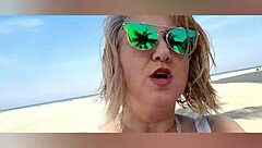 Mature blonde big tits solo beach pose