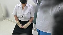 Doctor examines patient in hospital closely