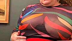 Horny BBW secretary flashes massive tits and panties casually