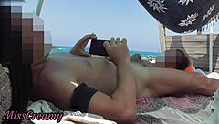 Exhibitionist wife strokes huge cock publicly on nude beach