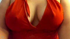 blonde in red lingerie shows big tits