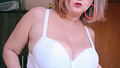 A casual story of a blonde amateur slipping into lacy lingerie for solo showcase at home