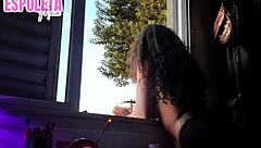 morena chats with neighbor showing off at window