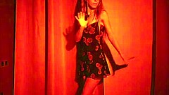 french girl relaxes with teasing dance striptease