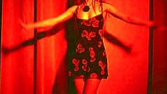 french girl relaxes with teasing dance striptease