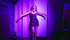 french girl relaxes with teasing dance striptease