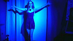 french girl relaxes with teasing dance striptease