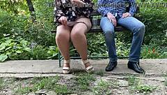 MILF's wet pussy nectar flashes outdoors in miniskirt